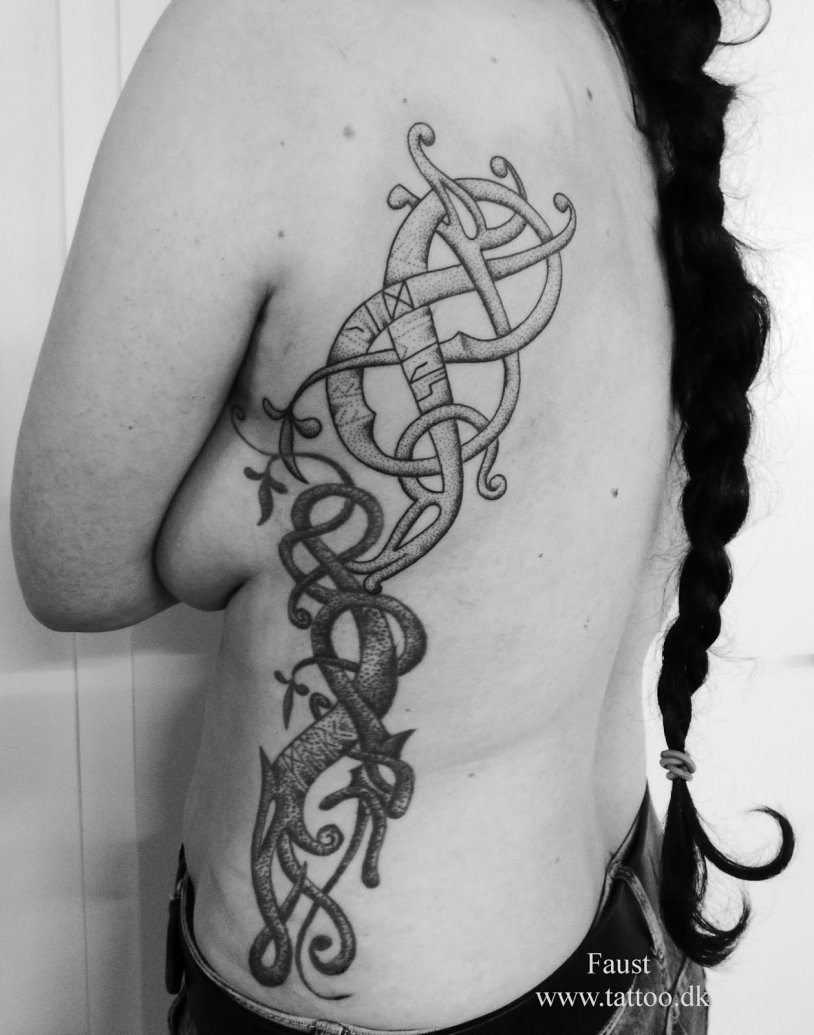 Polynesian tattoo on the hip