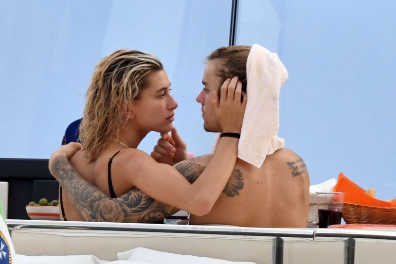 Justin Bieber and Haley on the beach