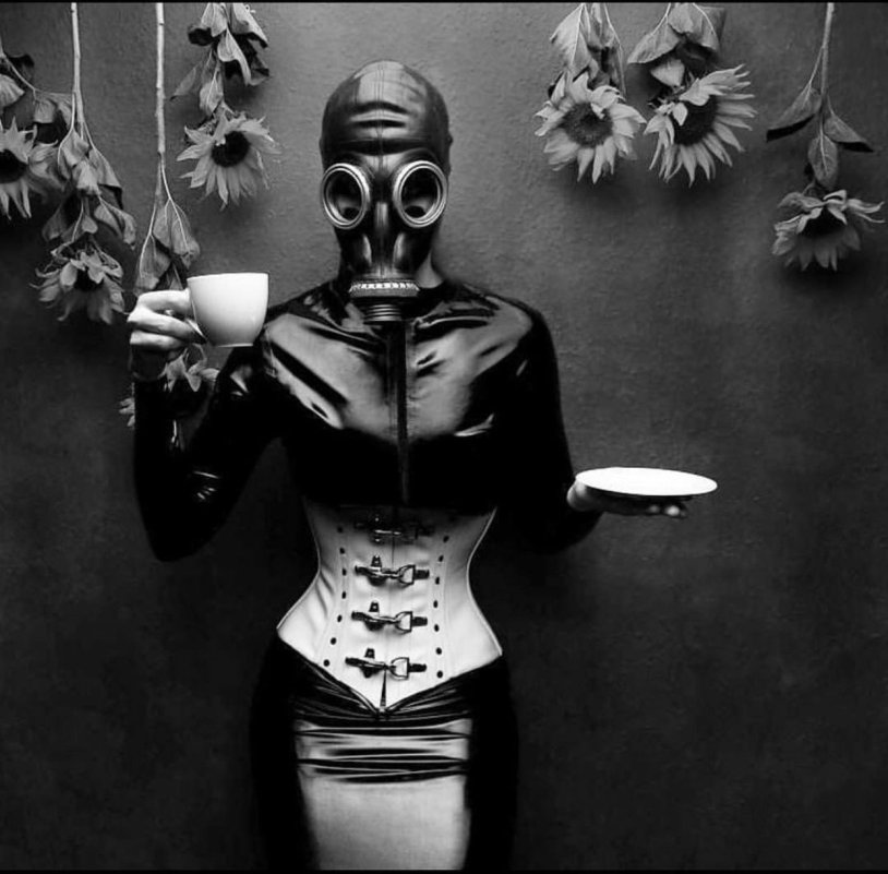 Girl in a gas mask with a rifle