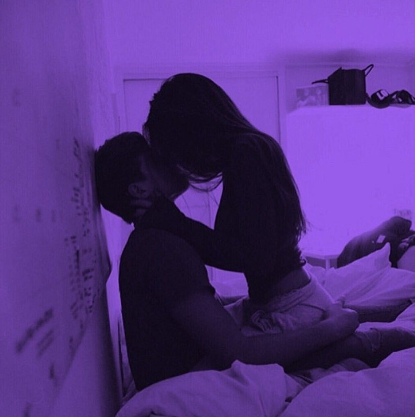 A guy with a girl in the dark