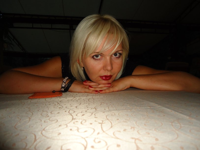 Ksenia Zagorodnaya in a swimsuit from the kitchen