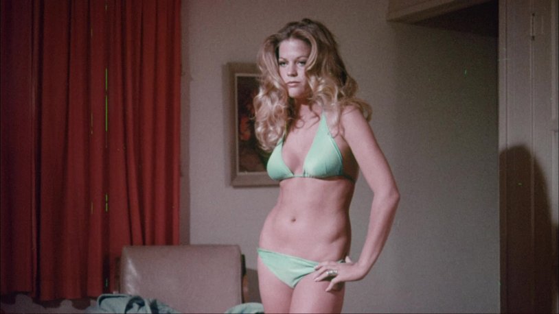 Mature in shiny tights