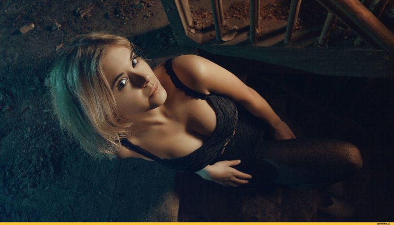 Brunette girl in bed