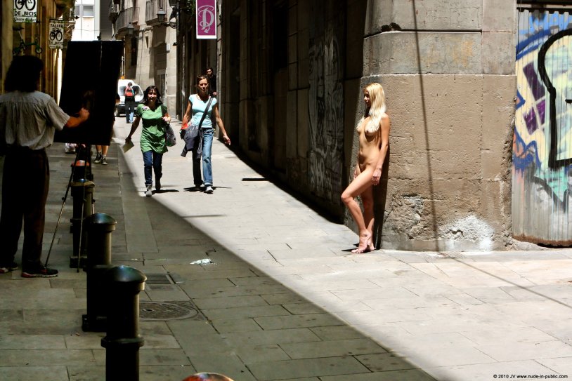 Naked along the street
