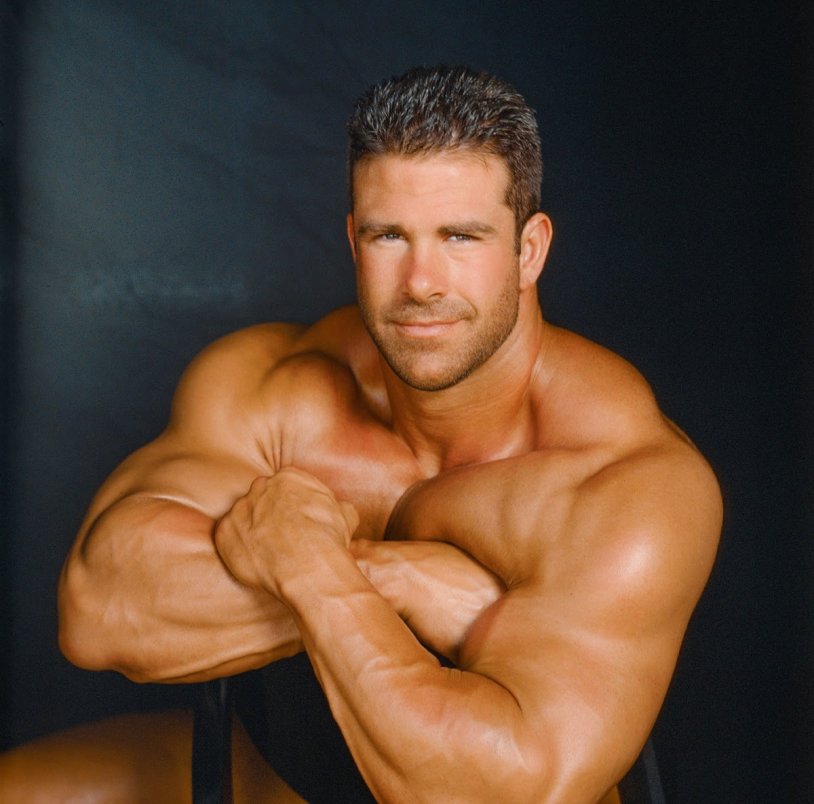 Naked man with a cup of coffee