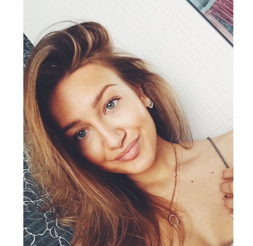 Alena Omovich in a swimsuit