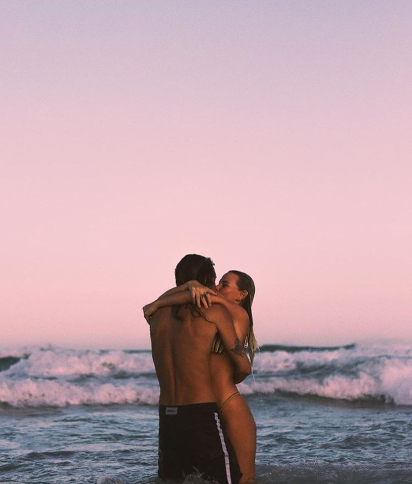 A guy with a girl at sea