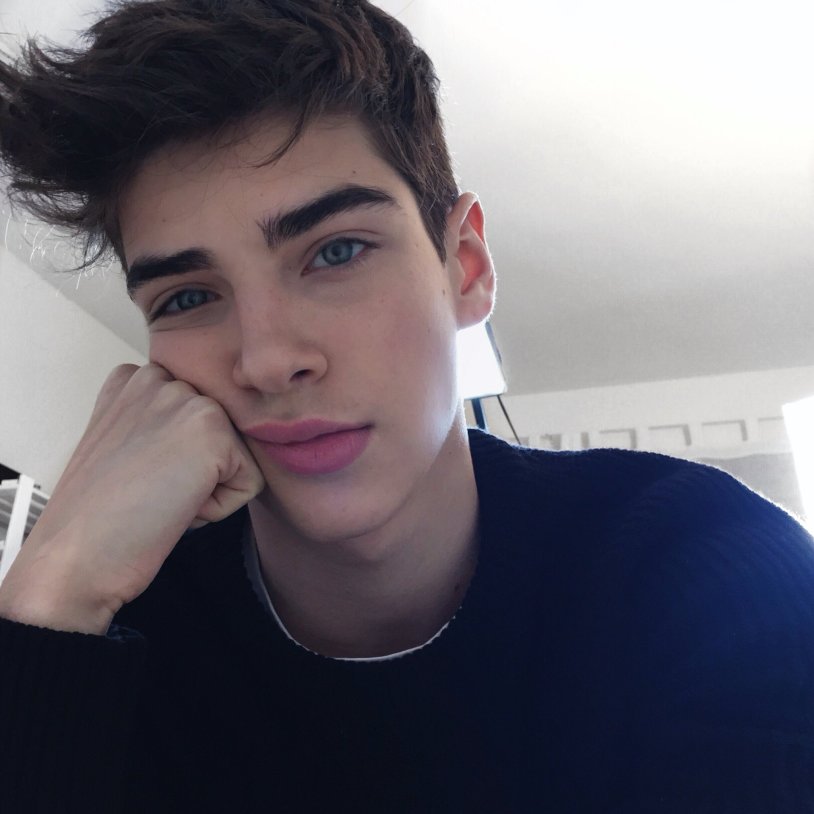 Manu Rios Young with glasses