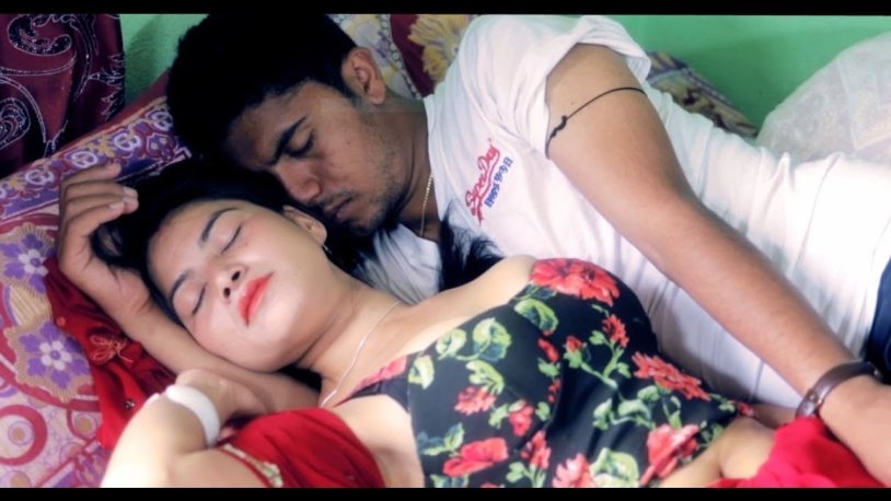 Passionate kiss on the couch