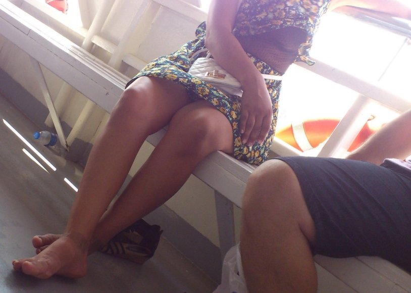 Legs in tights in the train