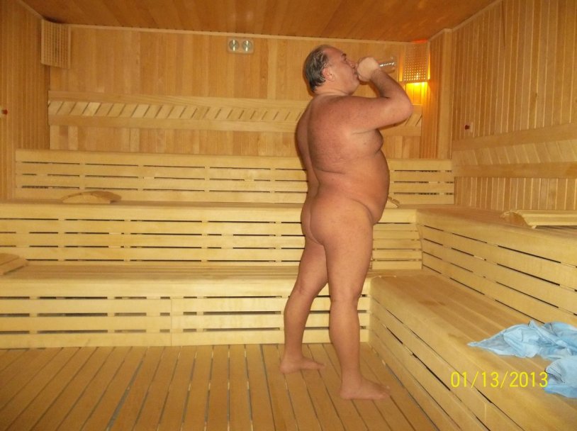 Naked fat men in a sauna