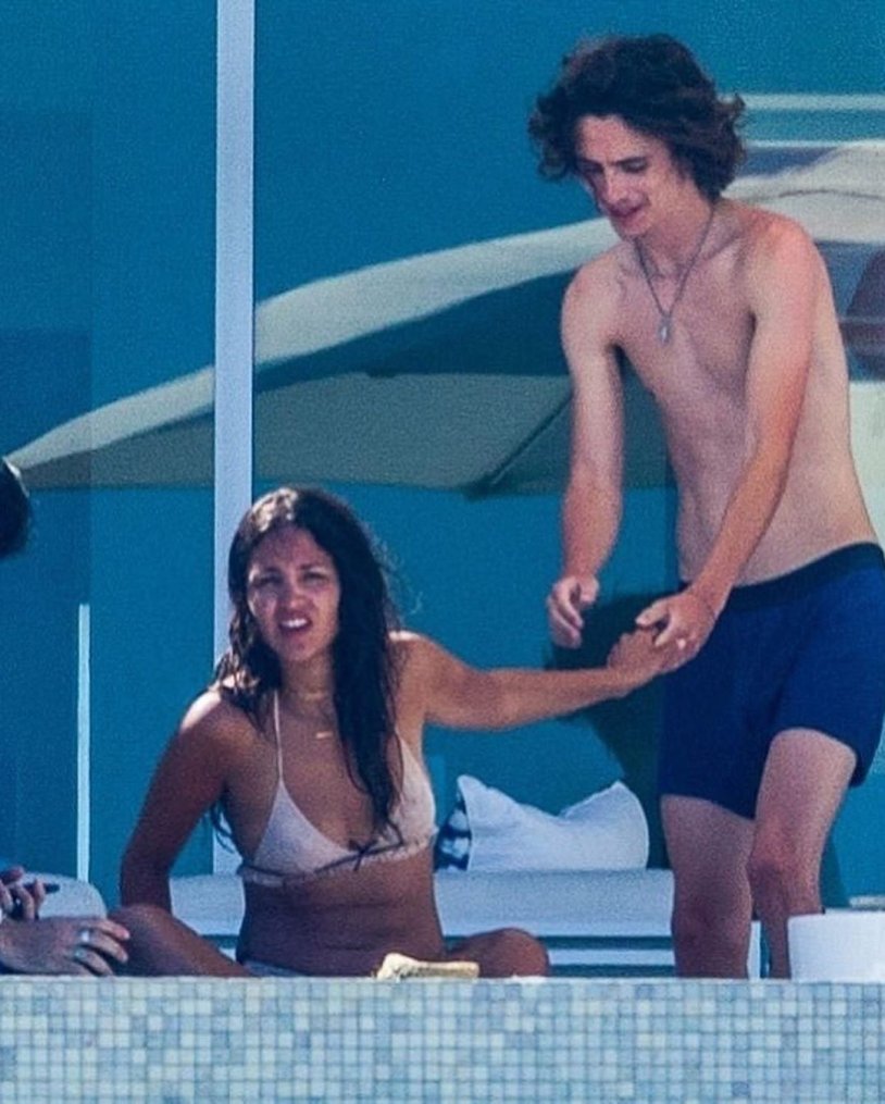 Timothy Shalame and Ace Gonzalez are engaged in the pool