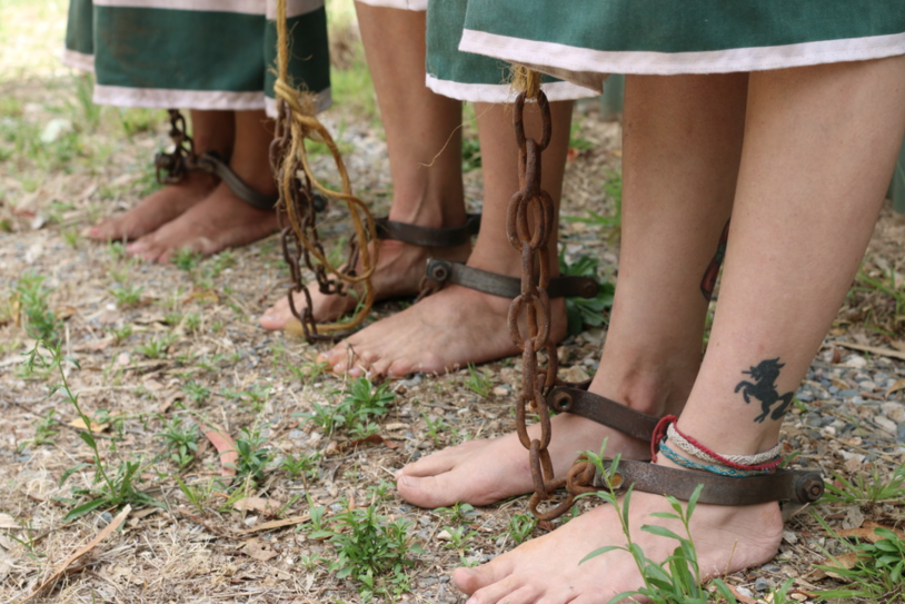 Surrounding slaves piercing