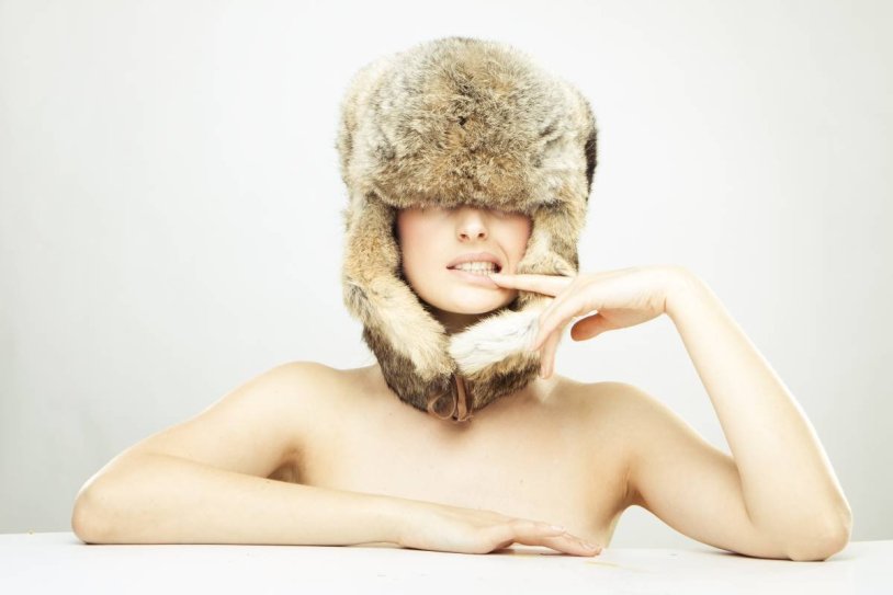 Girl in a fur cap nude