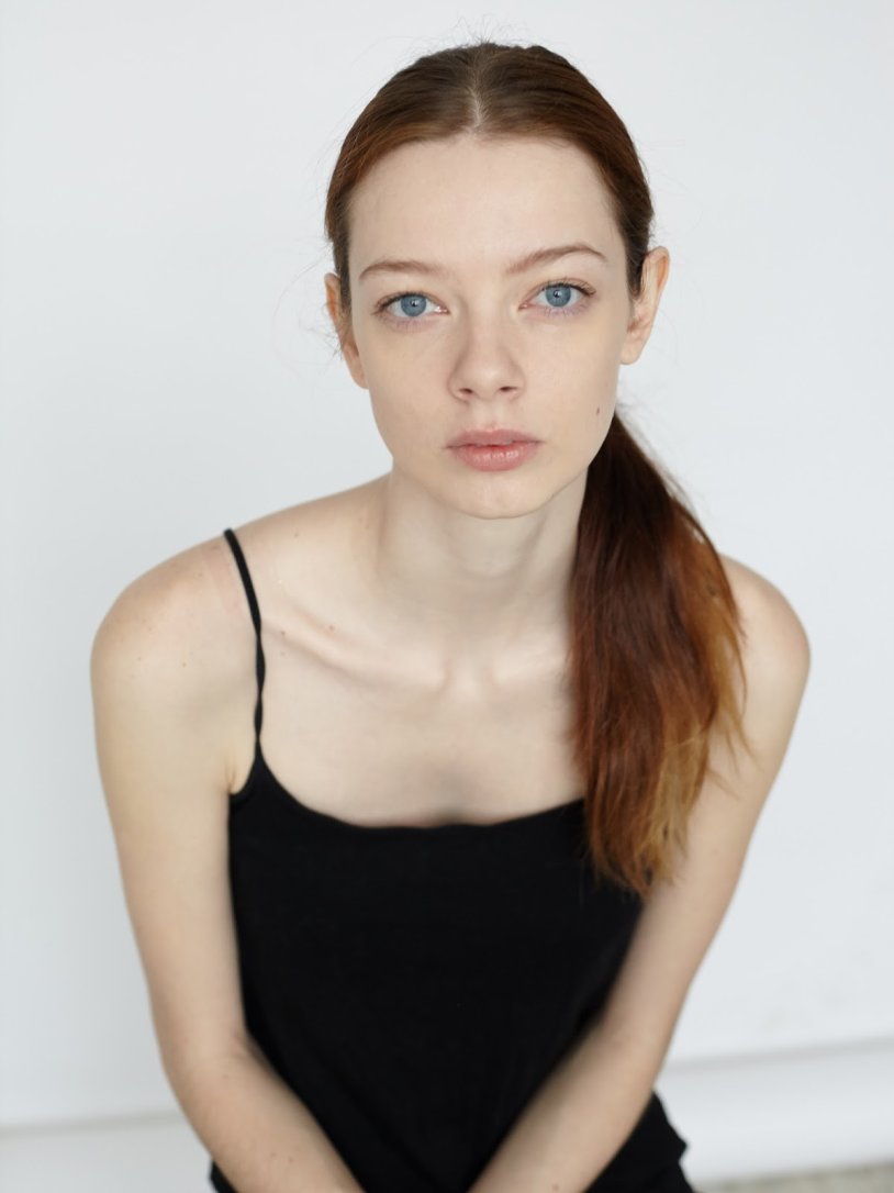 Girl with a tail in a T -shirt