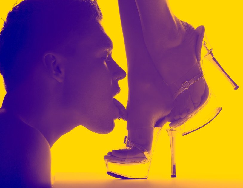 Slave kisses the legs of the lady