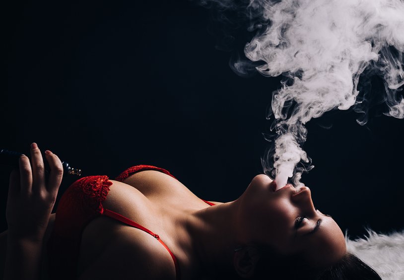 A guy with a girl in smoke