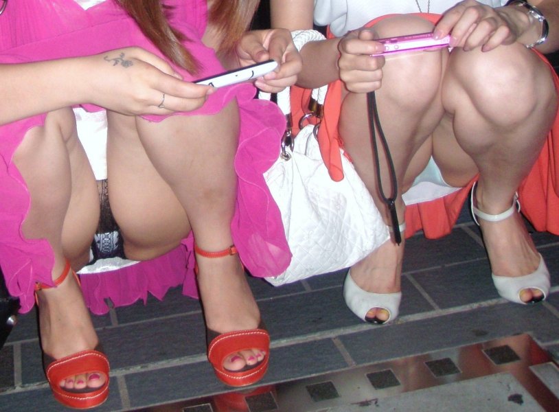 Without panties under a skirt with a tampon