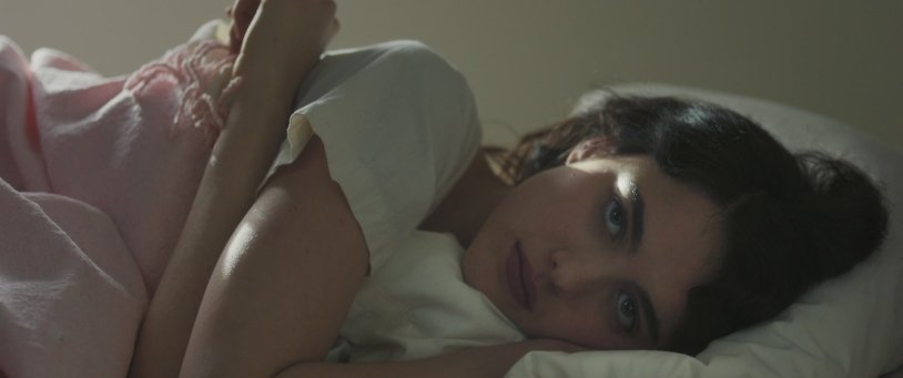 Zoe Holloway in jeans