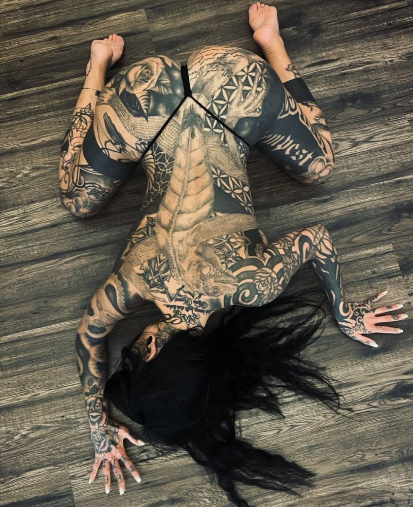 Tattooed model with big tits