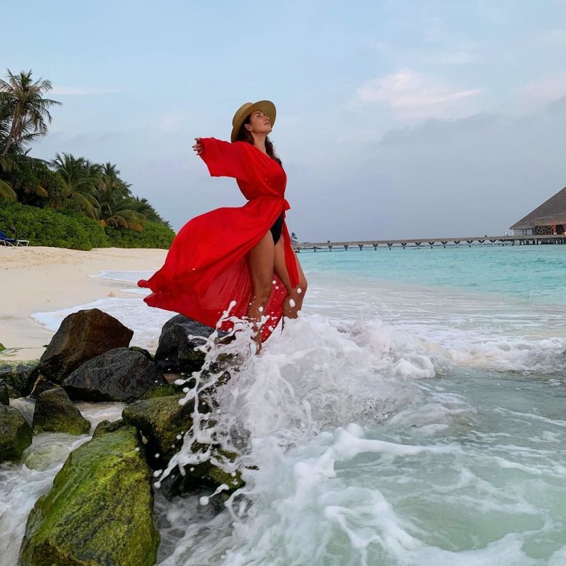 Jasmine singer in a swimsuit