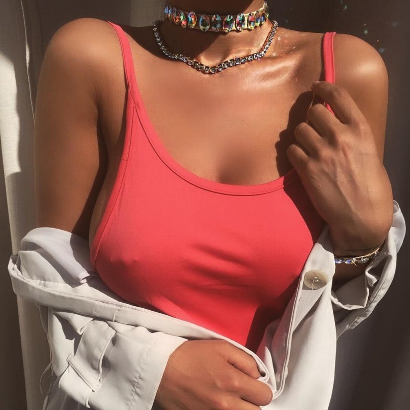 Girl with pierced nipples