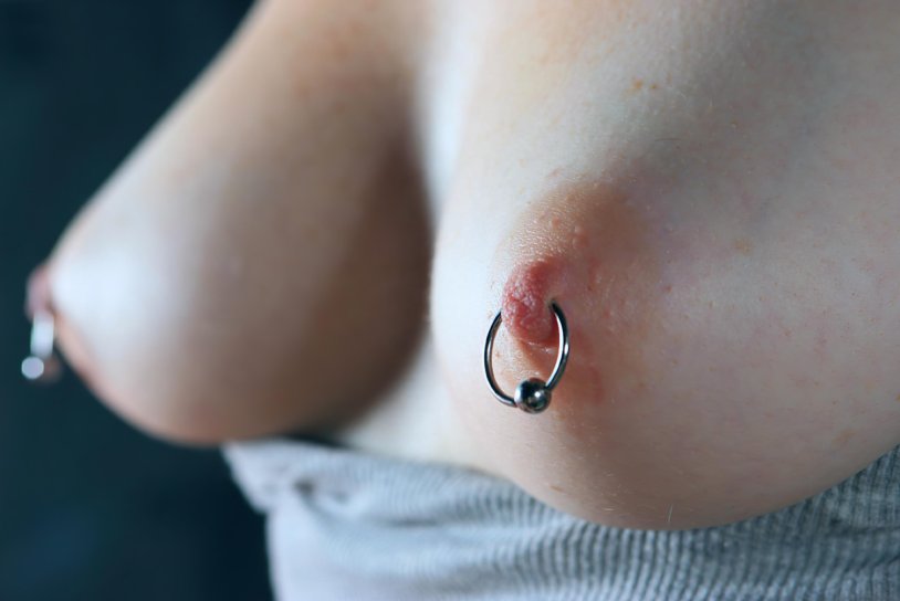 Large piercing of the nipples