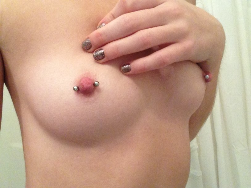 Vertical piercing of the nipples