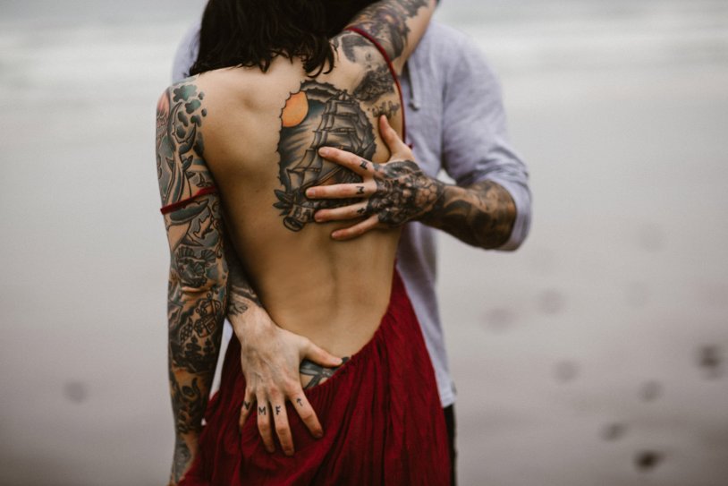 Tattooed guy with a girl