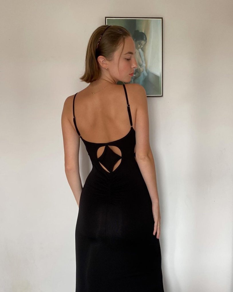 Amelie Belain in a dress