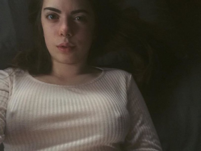 Girl sleeps without a bra