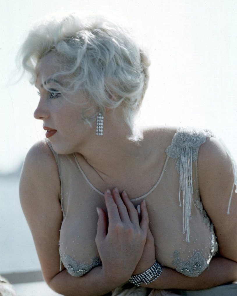 The girl smokes in the bathroom