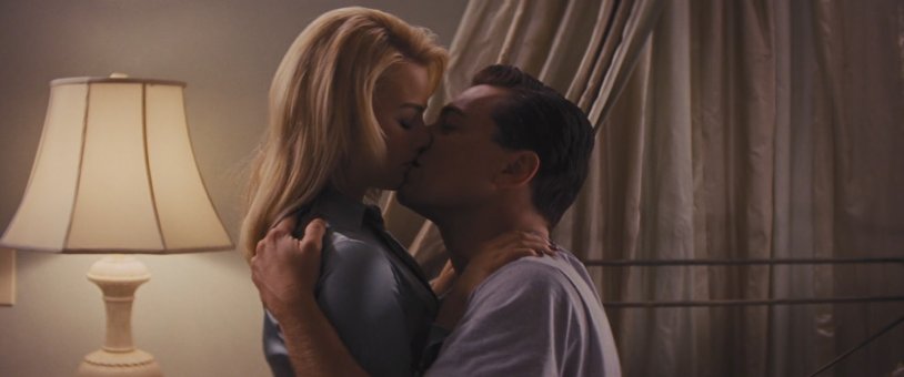 Margot Robbie and Tom Akkerli on the beach