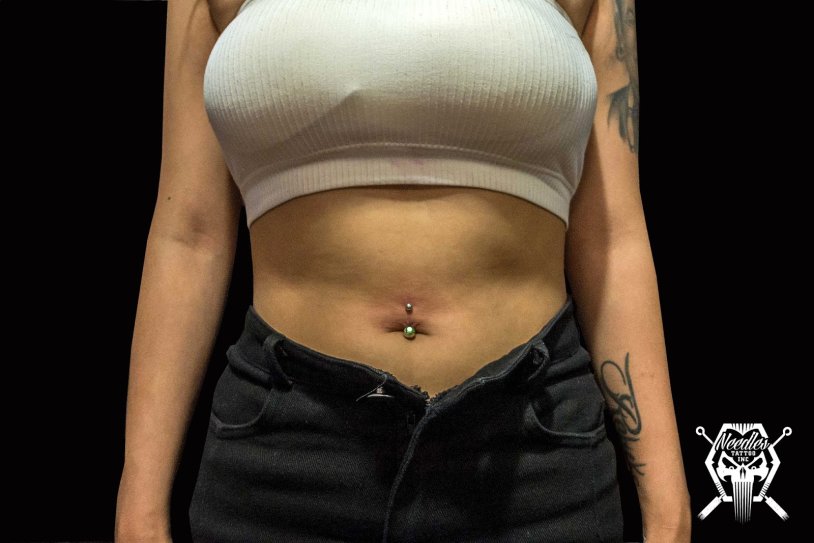 Tattooed blonde in shorts