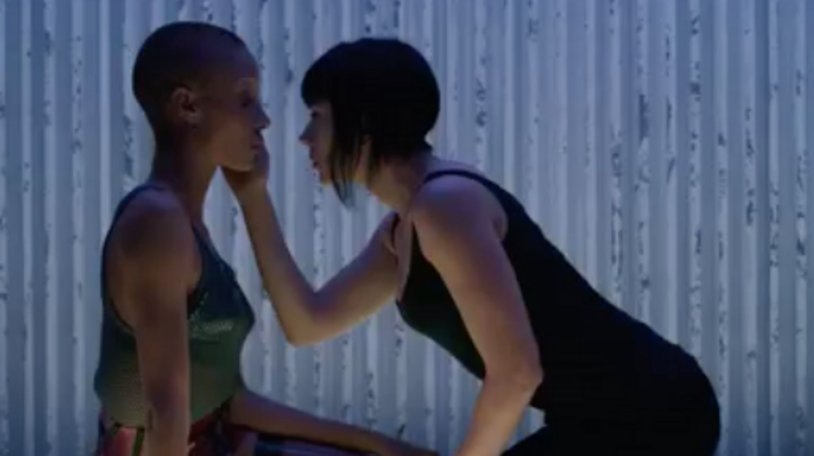 Ghost in armor kisses Scarlett Johansson