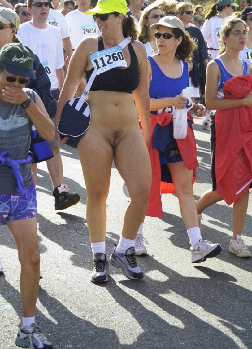 Girl in a T -shirt without panties on the street