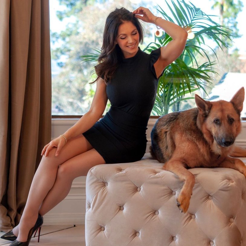 Veronica Belik in a dress