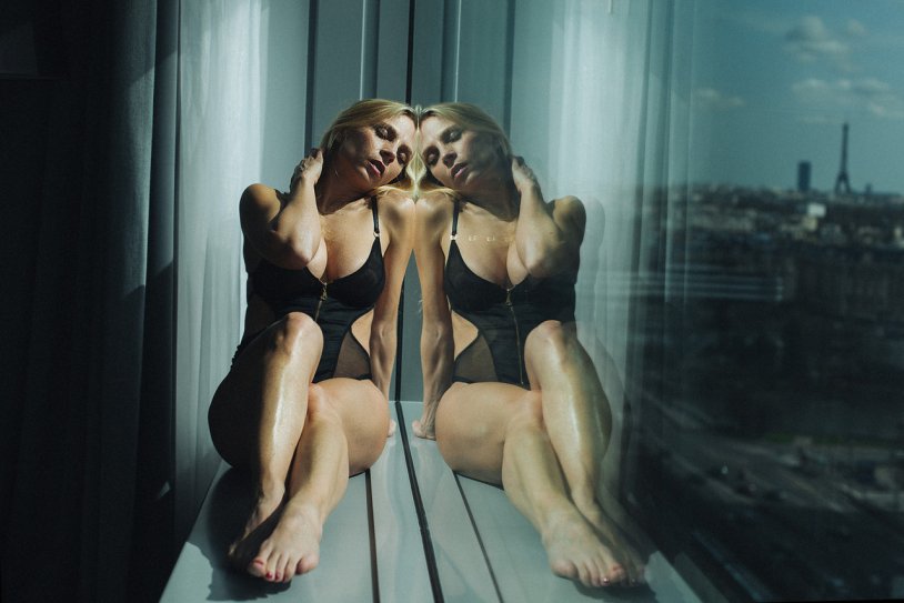 Naked behind the glass