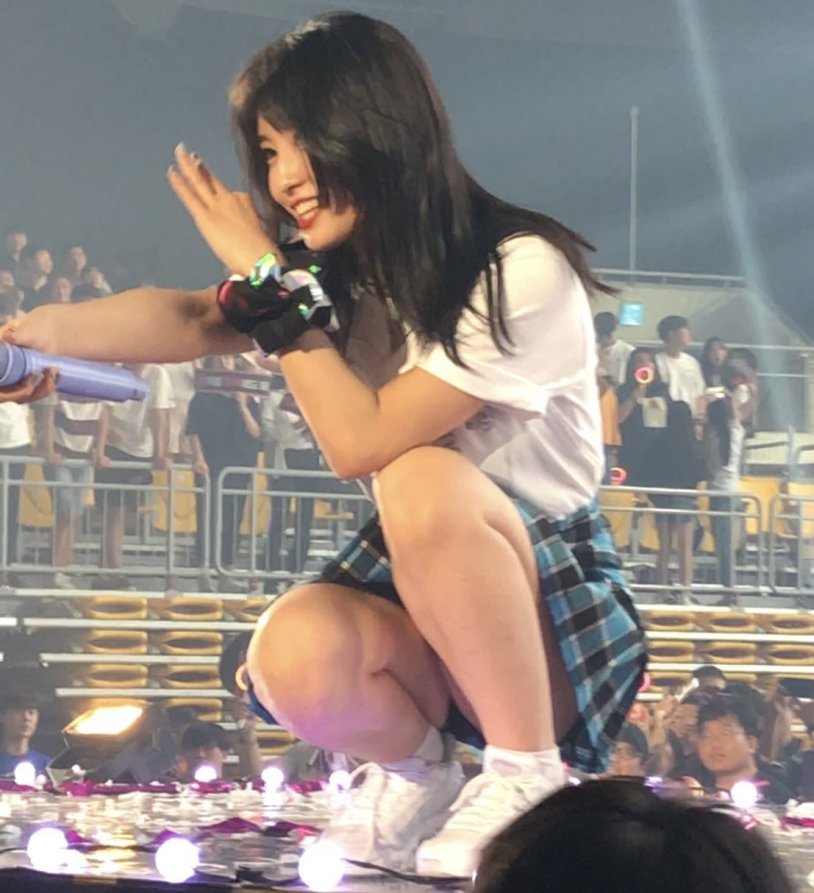 MOMO in all white on stage