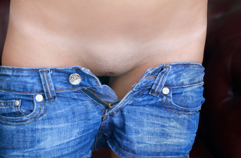 The girl lowered the jeans