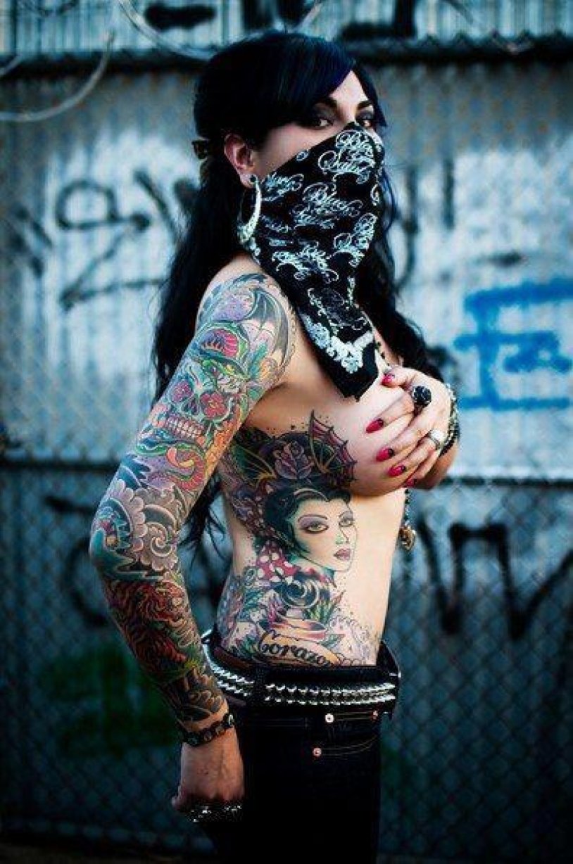 Girl with an octopus tattoo on her chest