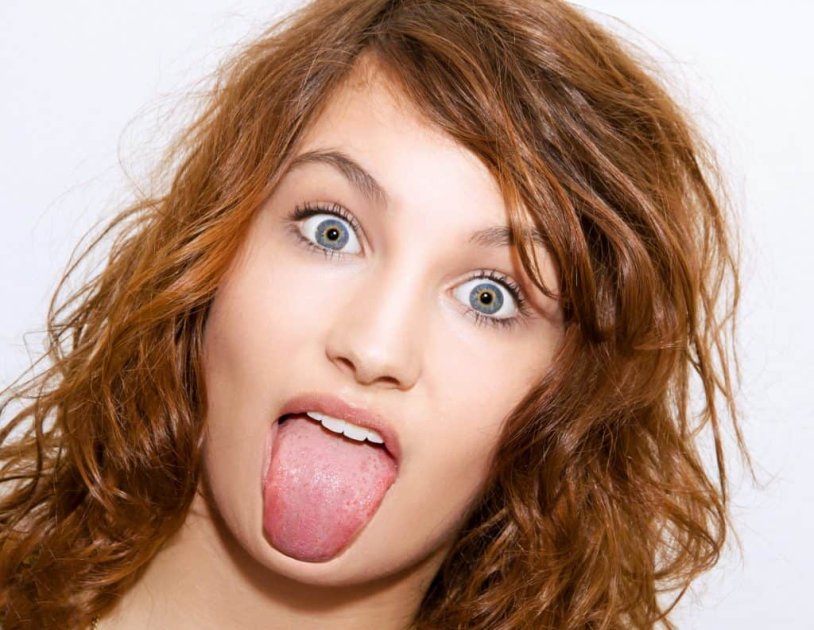 The Girl Shows Her Tongue