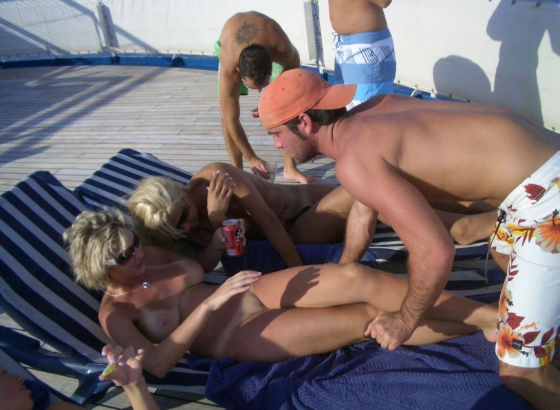 Young girls topless on a yacht