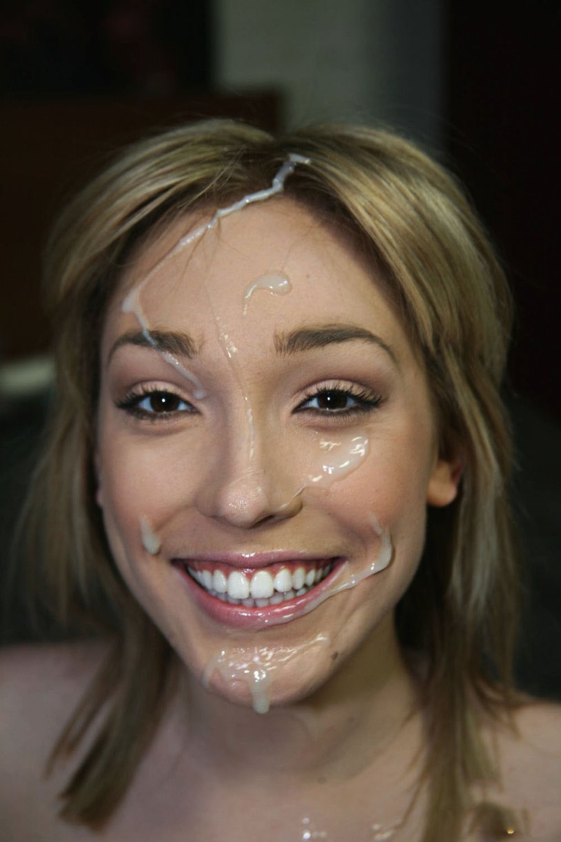 Smiles with a cumshot on his face