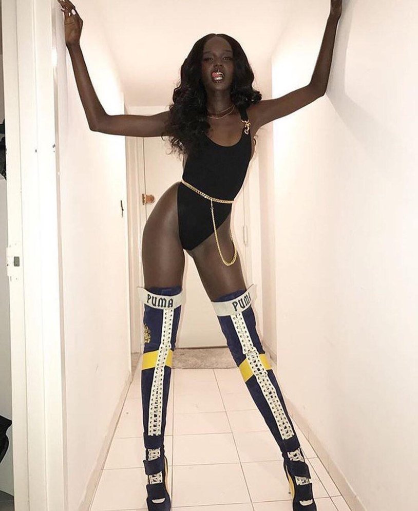 Duckie Thot Model in a swimsuit