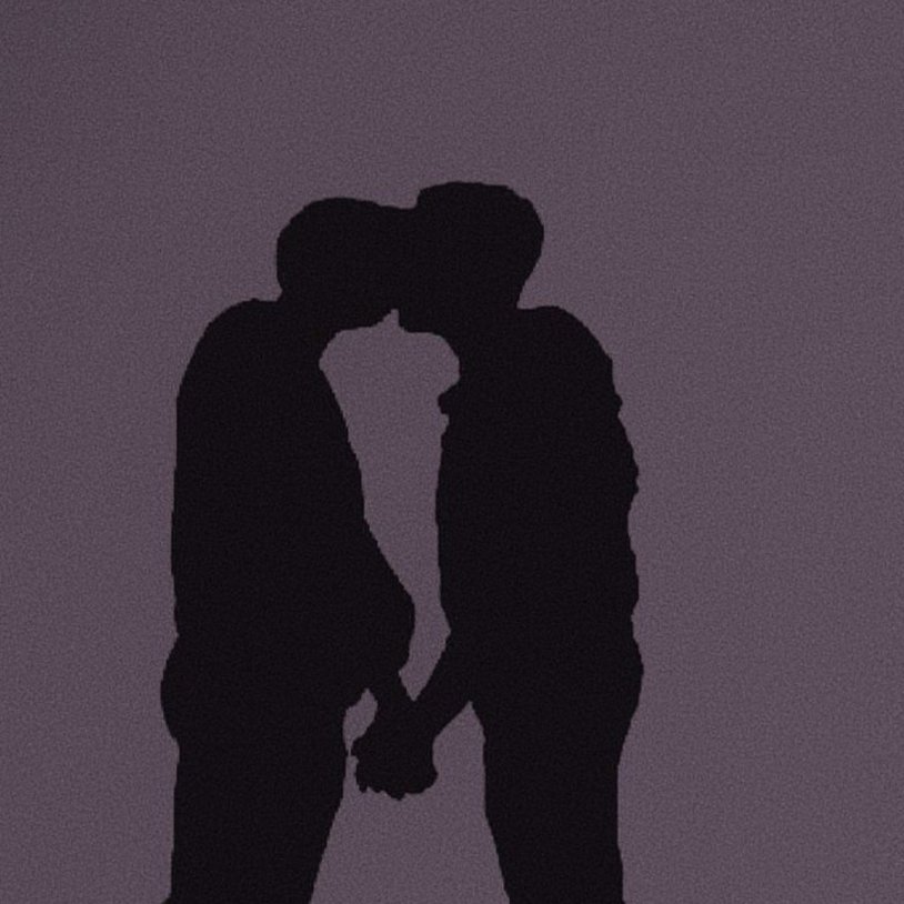 The silhouette of two guys