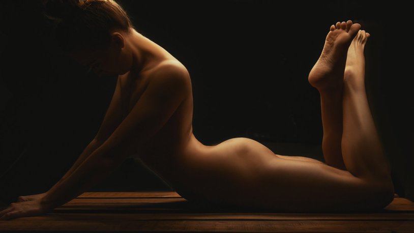 Men's hand on a naked female pope