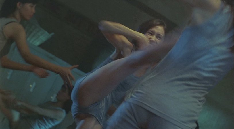 Maggie Kew in a swimsuit