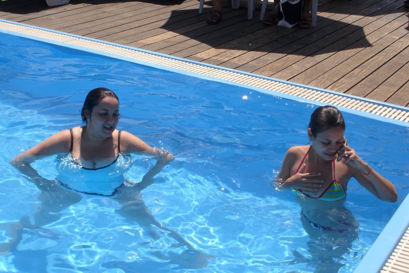 Mila Kunis 18 in the pool