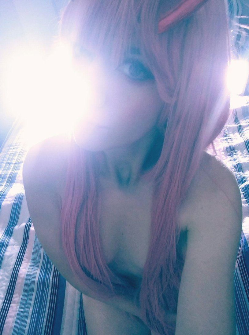 Levushka in bed with coffee